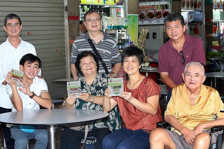 (From left, seated) Mr Jack Sai (with his father, Mr James Sai, behind him) of Coffee Break; Madam Yeo (with her husband, Mr Lee Li Yong); Ho Peng Coffee Stall's Madam Lee Saw Ean and her father-in-law, Mr See Choon Kim (with her husband, Mr See Chen