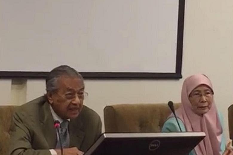Dr Mahathir was seated next to Dr Wan Azizah at the press conference yesterday. They nodded to each other but did not speak to each other - a reflection of 18 years of bad blood between the former prime minister and the Anwar family.