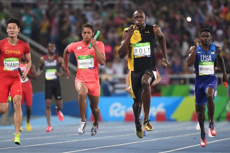 Japan's Aska Cambridge (centre) racing against Jamaica's Usain Bolt and China's Zhang Peimeng in the men's 4x100m relay final at the Rio Olympics. Japan won a surprise silver.