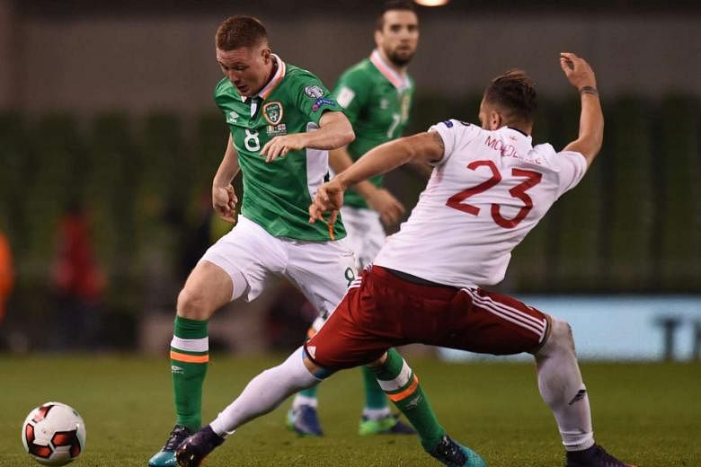 Midfielder James McCarthy (left) taking on Georgia's Levan Mchedlidze during the Republic of Ireland's 1-0 win. That World Cup qualifier on Oct 7 was McCarthy's first appearance since featuring for Everton on Aug 23. 