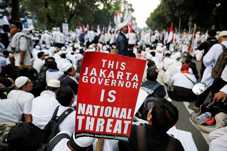Members of hardline Muslim groups protesting against Jakarta Governor Basuki Tjahaja Purnama, a Christian, in the Indonesian capital last Friday.