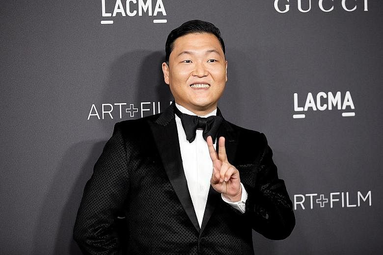 K-pop star Psy (left) has worked with artistic director Cha Eun Taek, an associate of Ms Choi's.