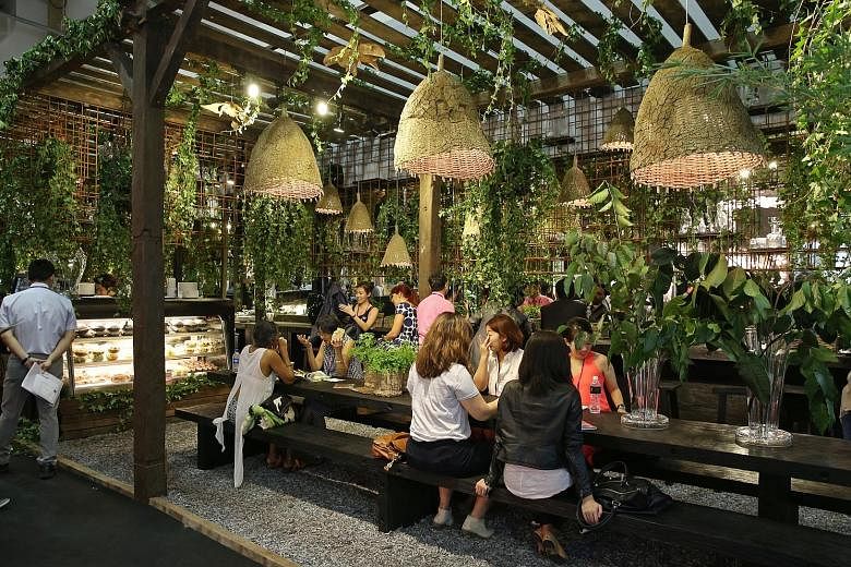 Visitors at a cafe at this year's Maison&Objet Asia at Sands Expo and Convention Centre. The event is the regional offshoot of the design trade show that began 21 years ago in Paris. It came to Singapore with much fanfare in 2014 and has introduced n