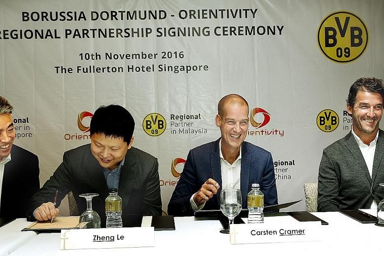 German Bundesliga football club Borussia Dortmund yesterday formalised a partnership with local sports and entertainment company Orientivity. The deal will see both parties help develop football in Asia, including holding football clinics with the cl