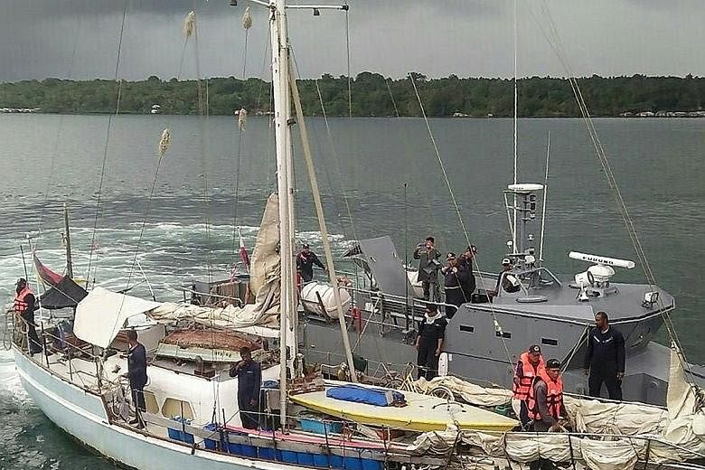Navy personnel on board the Rockall after it was recovered near Laparan island in Sulu province in Mindanao. Militants claim to have kidnapped the yacht's German sailor and killed his wife.