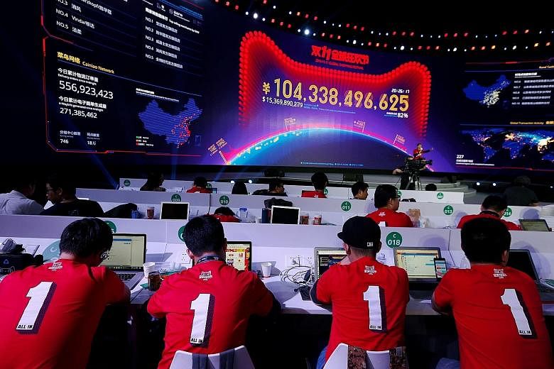 This screen at a media centre yesterday in Shenzhen, China, showing the value of goods being transacted during e-commerce giant Alibaba's Singles' Day global shopping festival. The figure has exceeded last year's total of 91.2 billion yuan (S$18.9 bi