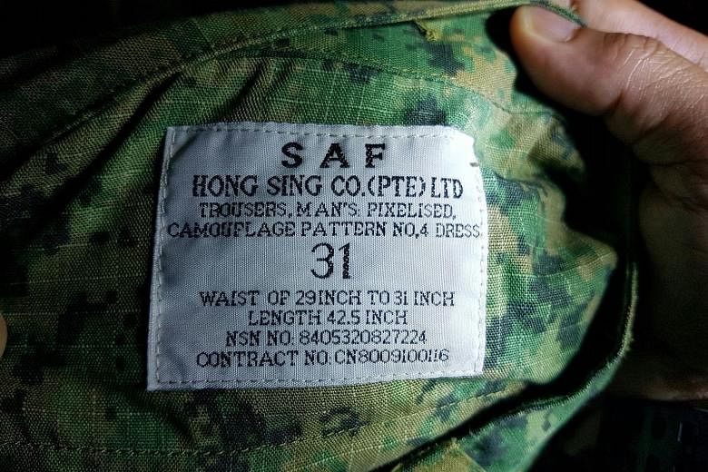 Green camouflage uniforms first issued by the SAF in 2008 and an older version with splotches of black, brown and green were found in a truck.