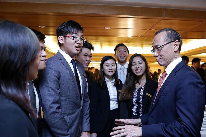 Mr George Yeo speaking to students from the Singapore Institute of Technology yesterday. Having a complicated identity means Singaporeans will always be arguing over a range of issues but this is a good thing, said Mr Yeo.