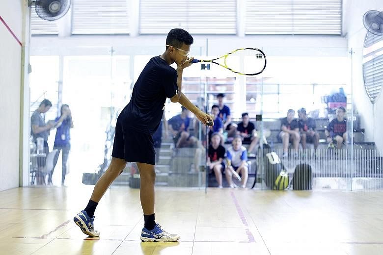 Muhammad Ridwan Kamsani, a member of the school’s squash team. Outram Secondary School has a squash complex which houses two courts.