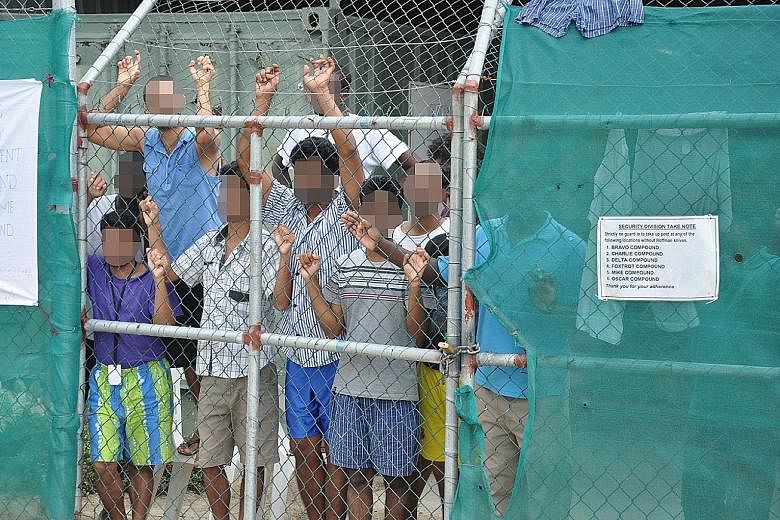 Asylum seekers at the Manus Island detention centre in Papua New Guinea. Australia's controversial offshore centres have long been described as illegal and cruel by the UN and human rights groups.