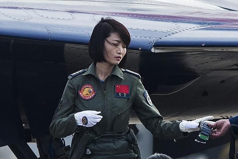 Capt Yu Xu, seen here in a picture taken in November 2014, was the first Chinese woman to fly a J-10 fighter jet. She died in a training accident.