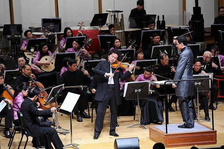 Violin virtuoso Lu Siqing with the Singapore Chinese Orchestra. The SCO concert Strings Fantasy will be the world's first Chinese orchestra concert to be digitally broadcast online.
