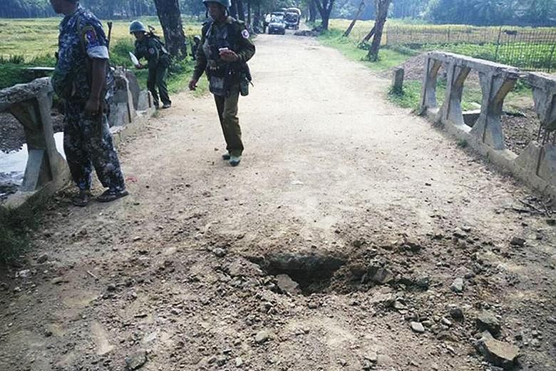 A crater left by a landmine explosion on a bridge in Maung Nama Taung village, northern Rakhine state, at the weekend. The authorities have restricted access to the area, making it hard to verify government reports or accusations of army abuse