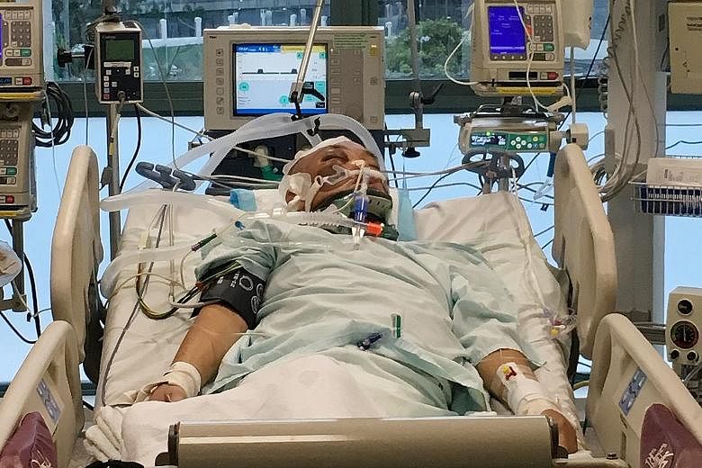 Mr Lim Chwee Leong (above, right) is in intensive care at Tan Tock Seng Hospital after falling down an escalator near Bishan MRT station's Exit D (above) last Saturday morning. SMRT is investigating the accident.