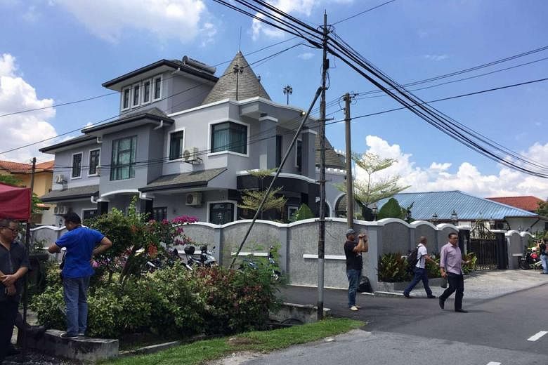 Datuk Adam's luxury house, on the outskirts of Kuala Lumpur. Mr Jamal, questioning how Datuk Adam, 28, could afford to buy the house, said that a report will be lodged with the Malaysian Anti-Corruption Commission over the opposition Parti Keadilan Rakyat