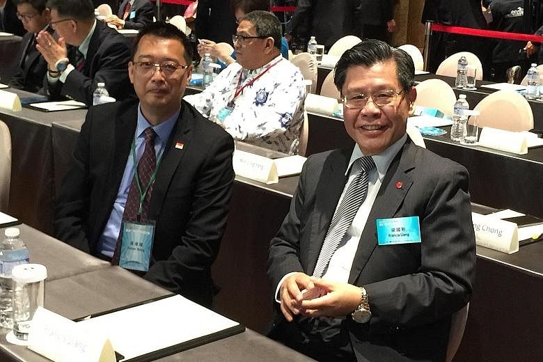 Singapore trade representative Simon Wong (left) seated next to Taiwan's new Singapore envoy Francis Liang at the first-ever Taiwan-Asean Dialogue in Taipei on Tuesday. The forum took place as Taiwan seeks to be Asean's "most reliable partner", while