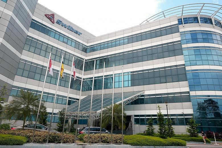 Swiber's office building at the International Business Park. The offshore oil and gas contractor collapsed under a mountain of debts and legal claims in July, and was placed under judicial management on Oct 6.