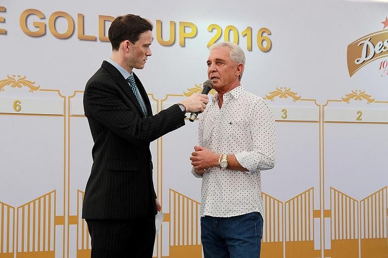 South African trainer Patrick Shaw (right) at the barrier draw of the Dester Singapore Gold Cup yesterday. The 60-year-old has four contenders in the field of 12, more than any other trainer, and is looking to win his third consecutive Singapore Gold