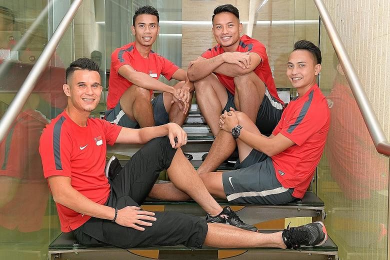 Key Lions players (from left) Baihakki Khaizan, Juma'at Jantan, Hassan Sunny and Shahril Ishak have dedicated their professional careers to helping Singapore win the AFF Cup after witnessing the Lions' embarrassing 4-0 home defeat by Malaysia in the 
