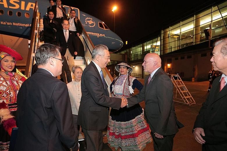PM Lee greeted by Peruvian Minister of Foreign Commerce and Tourism Eduardo Ferreyros Kuppers in Lima.