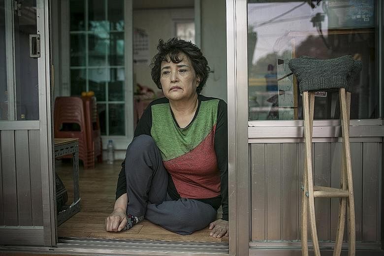 Madam Kwon, 61, is learning to speak English so that she can communicate with her son, Mr Crapser, whom she gave up for adoption in 1978 but who was deported from the United States this week.