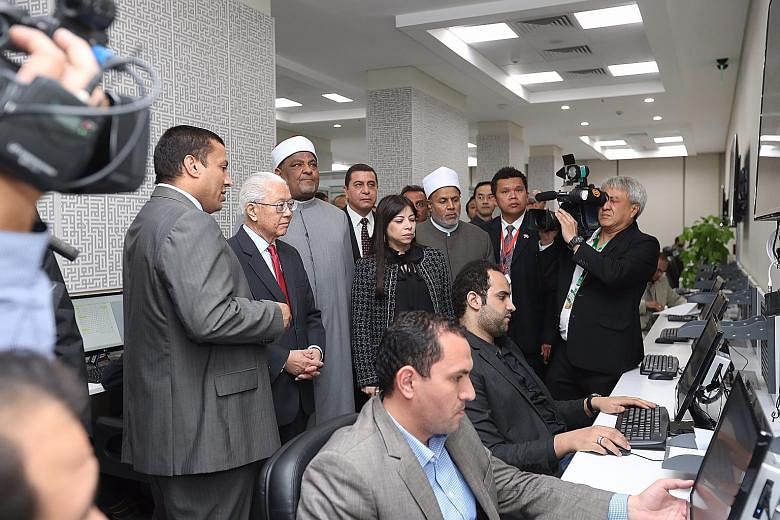 President Tony Tan on a tour of Al-Azhar University's Observatory for Foreign Languages in Cairo, Egypt, last month. The observatory monitors extremist ideology online, checking websites and social media in nine languages - including English, Chinese