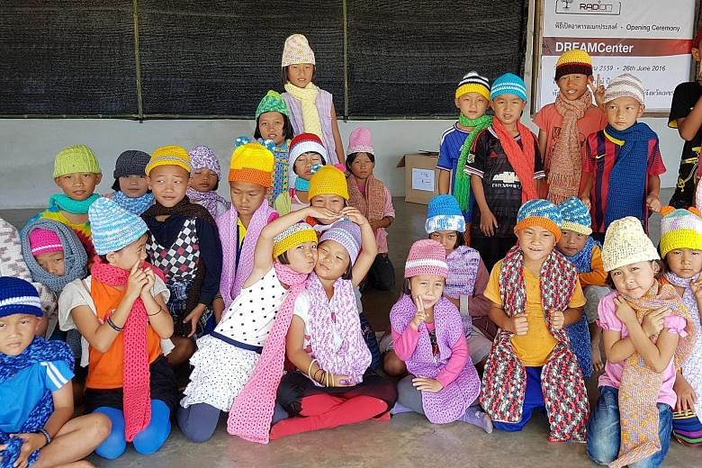 Members of Facebook group Yarns Spree made over 2,500 beanies, scarves, mittens and booties for underprivileged children in northern Thailand for charity Radion International's donation drive.