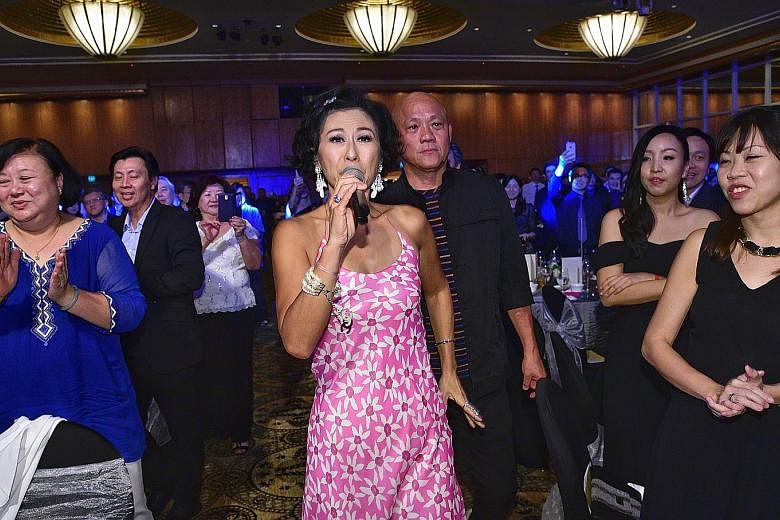 Mandarin pop star Sally Yeh, 55, belting it out at the 30th anniversary dinner of voluntary welfare organisation All Saints Home last night at The Ritz-Carlton, Millenia Singapore. All Saints Home, which runs four nursing homes and two daycare centre