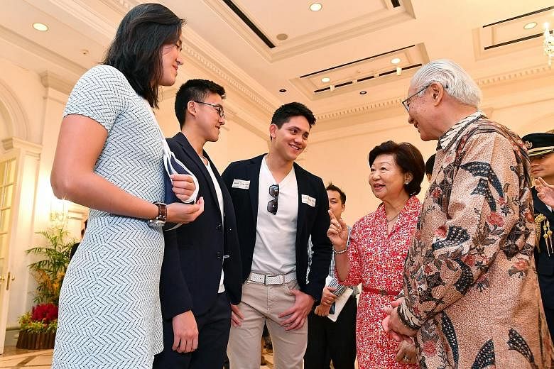 President Tony Tan and his wife Mary with (from far left) swimmers Quah Ting Wen and Quah Zheng Wen, and Singapore's first Olympic gold medallist Joseph Schooling. President Tony Tan Keng Yam and his wife Mary with athletes and officials who particip