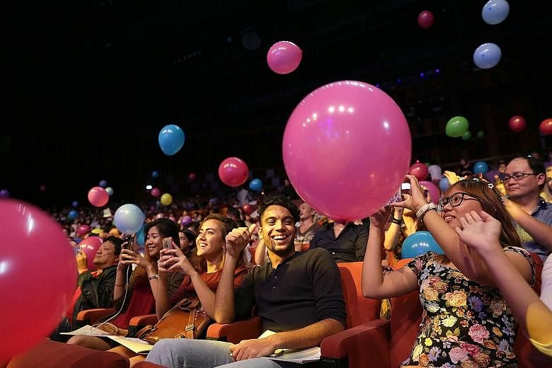 Balloons and confetti released on the 1,500-strong audience near the end of the concert drew gasps of delight.