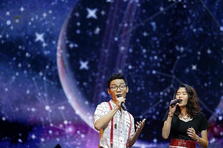 Adam Mark Lim, 17, and Jamie Ho, 15, singing their Moon Medley, comprising Blue Moon, It’s Only A Paper Moon, How High The Moon and Fly Me To The Moon, last Saturday.