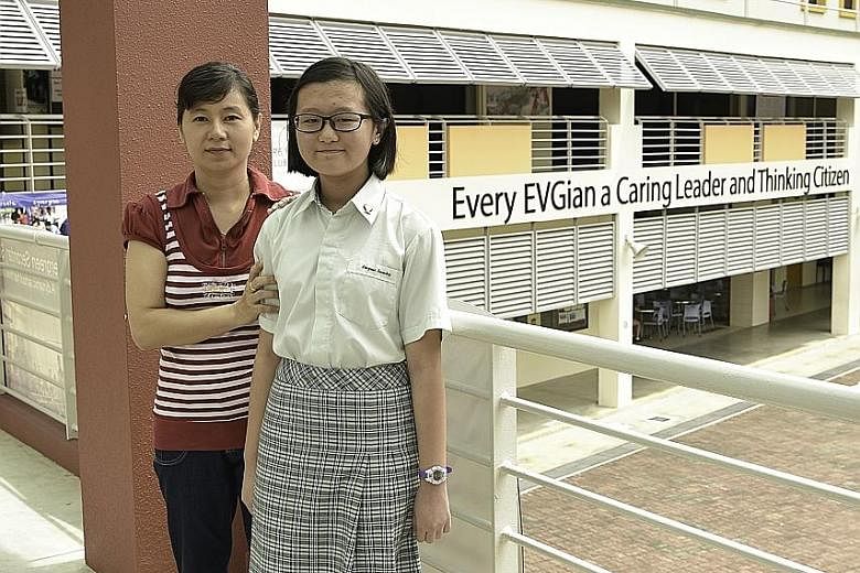Wei Ling, with her mother, Madam Lau, likes the environment at Evergreen Secondary School. The Secondary 1 student finds the teachers caring too.
