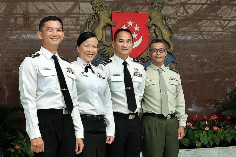 Among those who received the medal are (from left) Colonel Cheong Kwok Chien, Military Expert 3 Long Lin Jun, Military Expert 4 Roger Koh Kwang Hui and Lieutenant- Colonel (NS) Mark Benjamin Ortega.