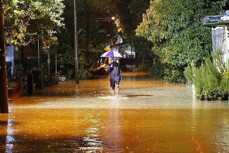Floodwaters in Kampung Makam in Penang. A 42-year-old man died after he slipped into the Prai River in mainland Penang and drowned.