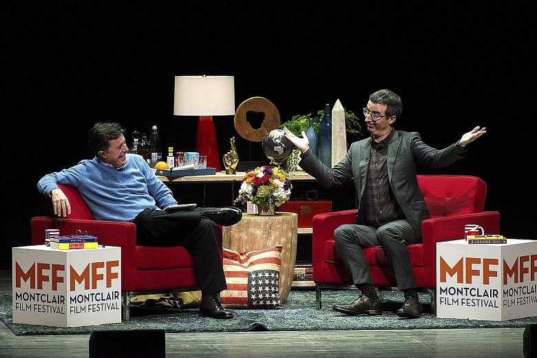 Stephen Colbert (left) and John Oliver hosting Wow, That Was Weird: A Post-Election Evening With Stephen Colbert And John Oliver.