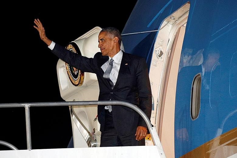 Mr Obama boarding Air Force One after attending the Apec Summit in Lima, Peru, on Sunday. His trip was dominated by the deep uncertainty Mr Trump has unleashed about the world order with his attacks on free trade and the role of the US as global poli