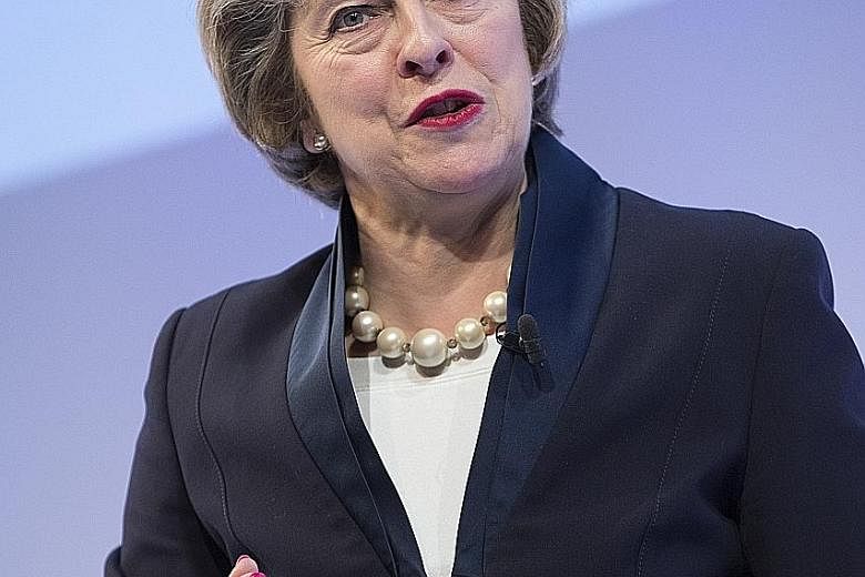 Mrs May also moved to ease concerns among company bosses who had been alarmed by a plan to put workers on boards and to tackle excessive executive pay.
