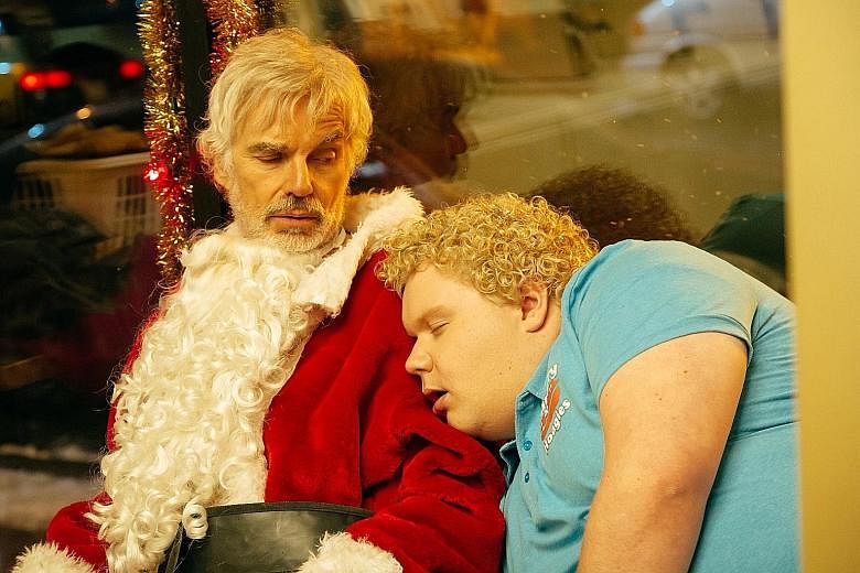 Bad Santa 2 sees the return of Billy Bob Thornton (above left) as Willie and Brett Kelly as Thurman Merman.