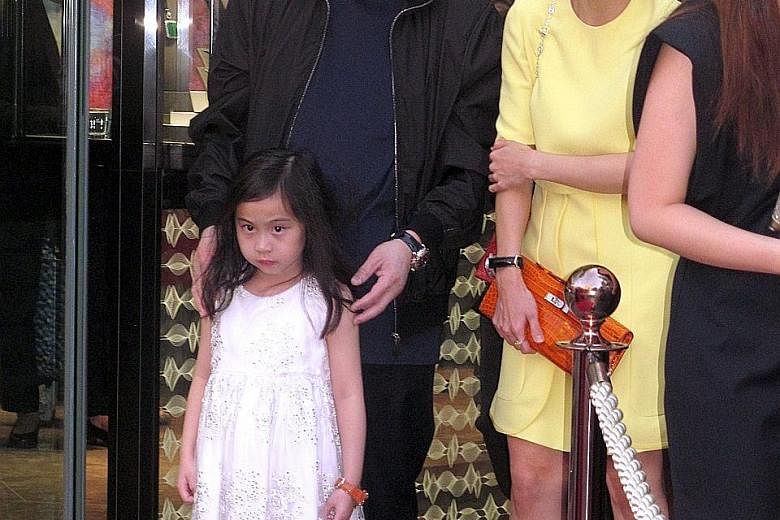 Hong Kong's fifth richest man Joseph Lau (above) with Ms Kimbie Chan and their daughter, Josephine, in Hong Kong in 2014.