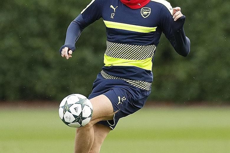 Arsenal's Olivier Giroud in training ahead of Paris Saint-Germain's visit. The Frenchman will be looking to add to his season's tally of one goal in Europe.