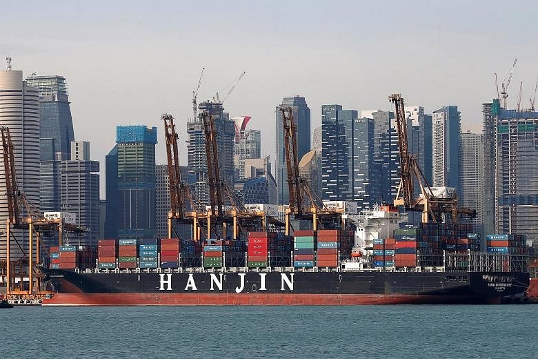 A Hanjin container ship docked at PSA's Tanjong Pagar terminal. The bankrupt South Korean shipping line is selling part of its container business for $44.7 million - although this represents only a small portion of the $1.1 billion total claims by cr