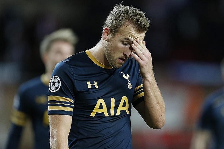 Harry Kane looking dejected after Tottenham crashed out of the Champions League following their 2-1 defeat by Monaco.