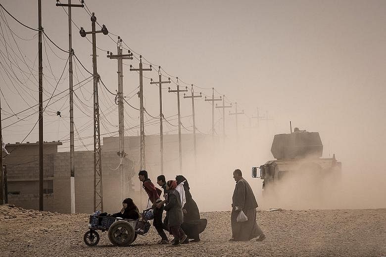Iraqis fleeing Mosul as the battle to retake the city from ISIS turns into a gruelling fight. Almost 70,000 people have been displaced so far, roughly half of them children, says the UN. But there could be a million more people still in the city, Ira
