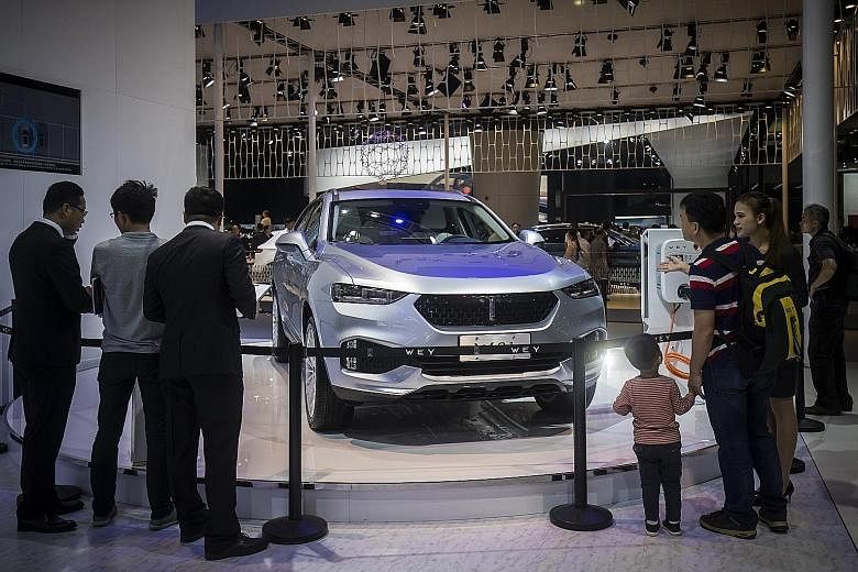 A Wey sport utility vehicle, manufactured by Great Wall Motor, on display at the Guangzhou Auto Show last weekend. Great Wall chairman Wei Jianjun wants the Wey brand "to carry the flag for Chinese luxury SUVs globally and to end the era of excessive
