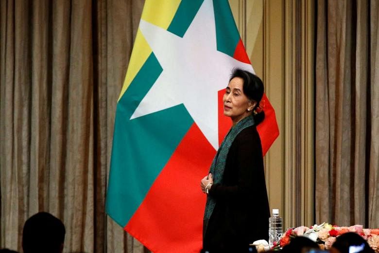 Ms Suu Kyi attending a meeting in Tokyo with Myanmar citizens residing in Japan on Nov 2. Prior to this, she had visited China, India and the United States, gaining support and concessions from all countries. 
