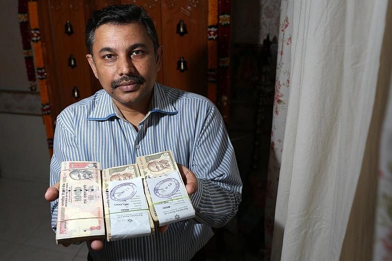 Mr Balu, who bought $4,000 worth of rupees from a bank in Bangalore in August, has to return to India to exchange them for new ones by the end of March. Since India's move to invalidate its 500 and 1,000 rupee bills earlier this month, money changers