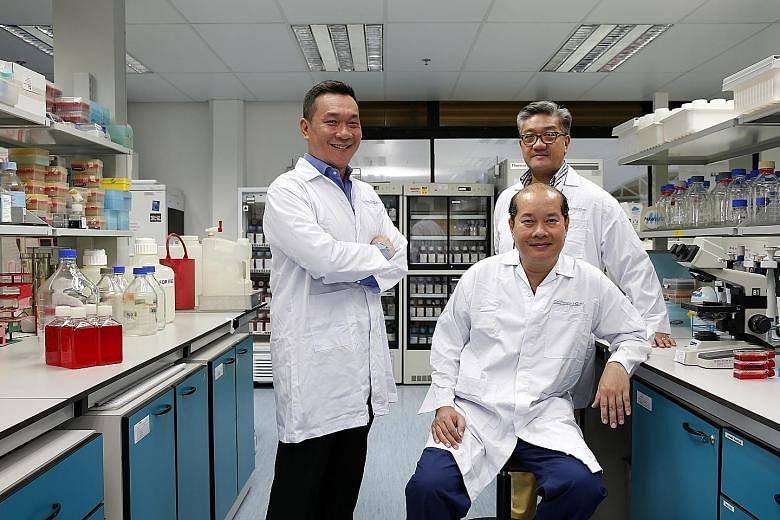 CellResearch - founded by (standing from left) group chief medical officer Ivor Lim, group chief executive Gavin Tan and group chief scientific officer Phan Toan Thang (sitting) - is now worth $700 million and has 39 patents worldwide.