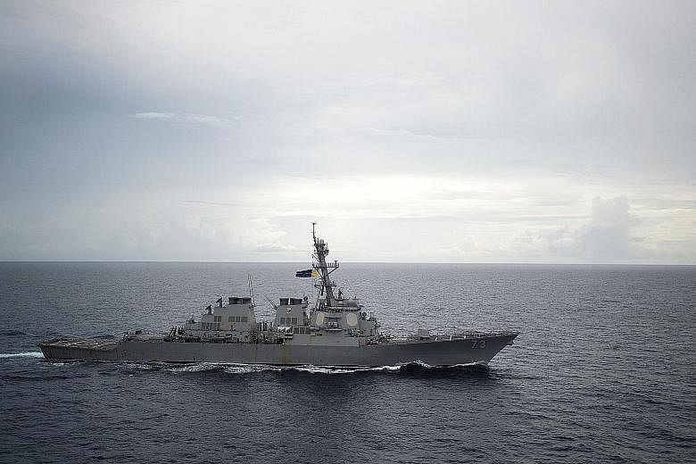 The guided-missile destroyer USS Decatur in the South China Sea last month. A Chinese think-tank has warned that continued targeted operations by US patrols would lead to militarisation of the waters.
