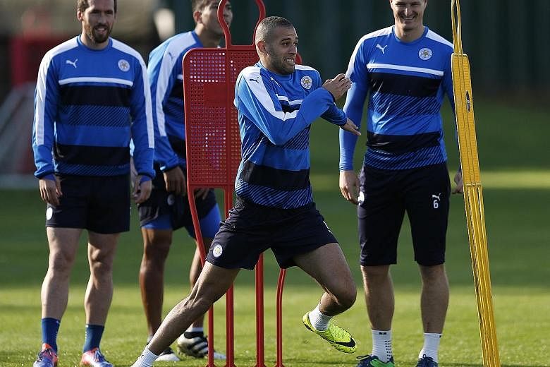 (From left) Leicester's Christian Fuchs, Islam Slimani and Robert Huth during training. Slimani may play after recovering from a groin injury.
