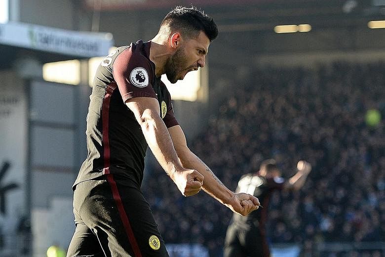Manchester City's Sergio Aguero celebrating after netting the equaliser against Burnley. He went on to score a second to secure a 2-1 English Premier League win for City.